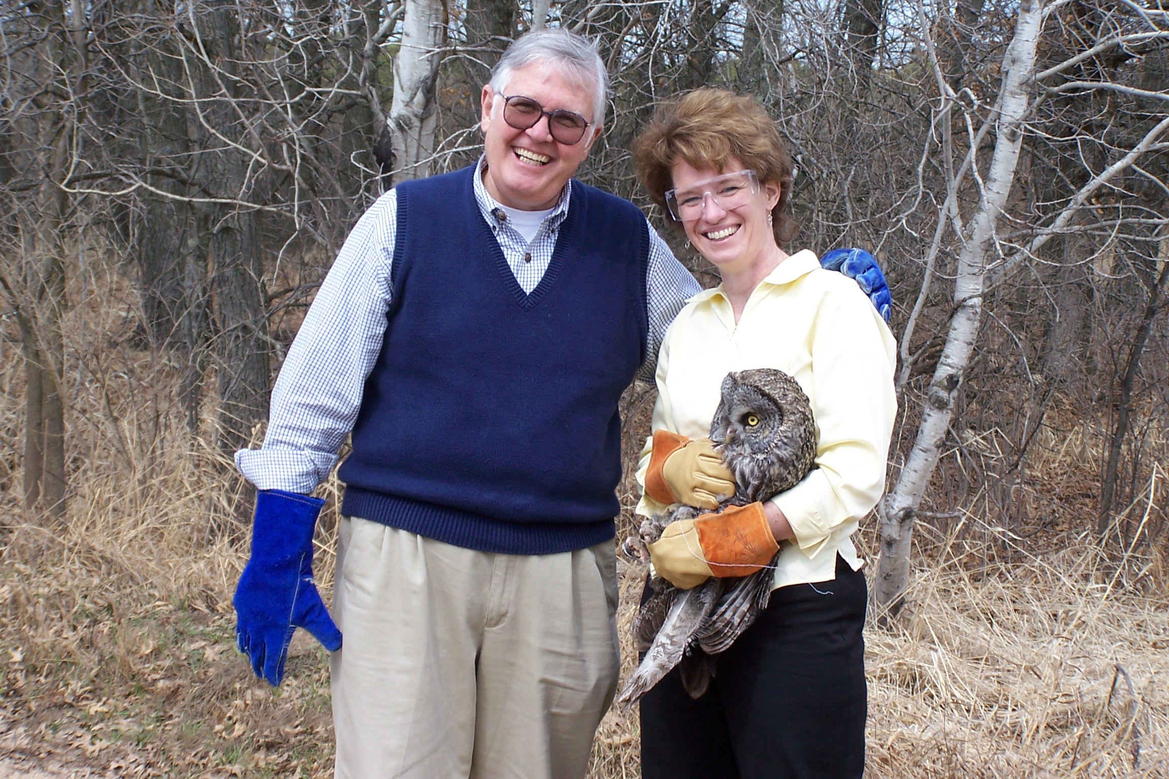 Paul Verret with Dr. Julia Ponder with great gray owl