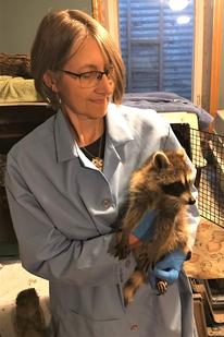 Gail with a racoon