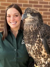 Dr. Victoria Hall with Lutsen the bald eagle